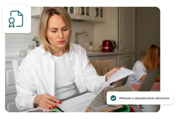 Kobieta analizująca dokumenty w ramach przygotowywania wniosku o zabezpieczenie alimentów.