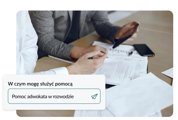 Osoba podpisująca dokumenty związane ze sporządzeniem pozwu o alimenty, w trakcie konsultacji z adwokatem.