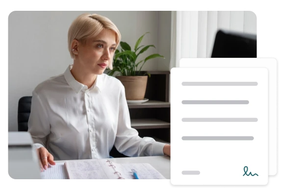 Kobieta przeglądająca dokumenty dochodowe w ramach przygotowania do sprawy o alimenty.